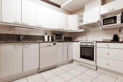 The fully equipped kitchen of Evo Grand Villa's ground floor.