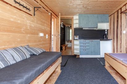 The sofa in Aulanko Lakeside's lakefront sauna dressing room can also be used as an additional bed.