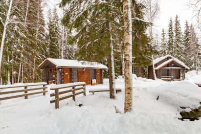 The dry toilets at Evo Syväjärvi are located at the ends of the maintenance building.