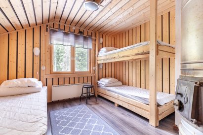 3-person upstairs bedroom of Evo Wilderness Villa.