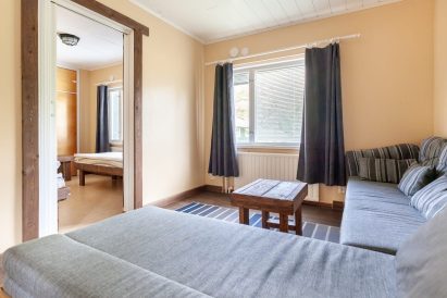 In connection with the sauna section of Evo Lakeside Villa, there is a living room, and the sofas can also be used as beds.