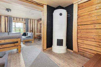 Adjacent to the main hall at Tavastia Privacy, there is a cozy cabin with a sofa that can also be used as a bed.