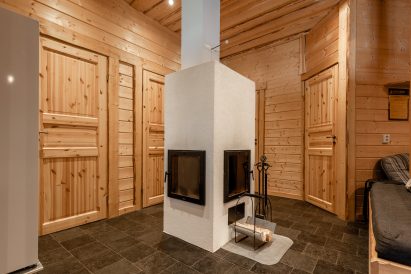 The stove of Loppi Wilderness Villa's main hall.